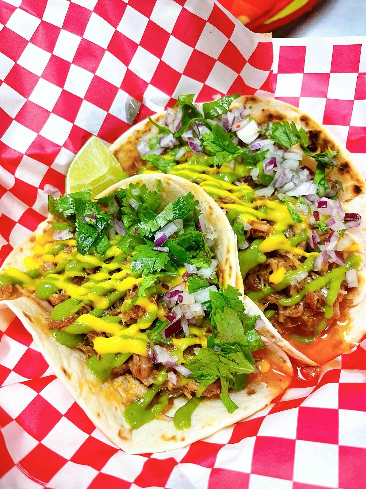 Two tacos on a plate in Kensington