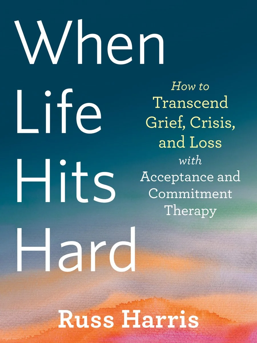 Book cover titled "When Life Hits Hard" by Russ Harris, with a subtitle about transcending grief, crisis, and loss using acceptance and commitment therapy, set against a colorful gradient background.