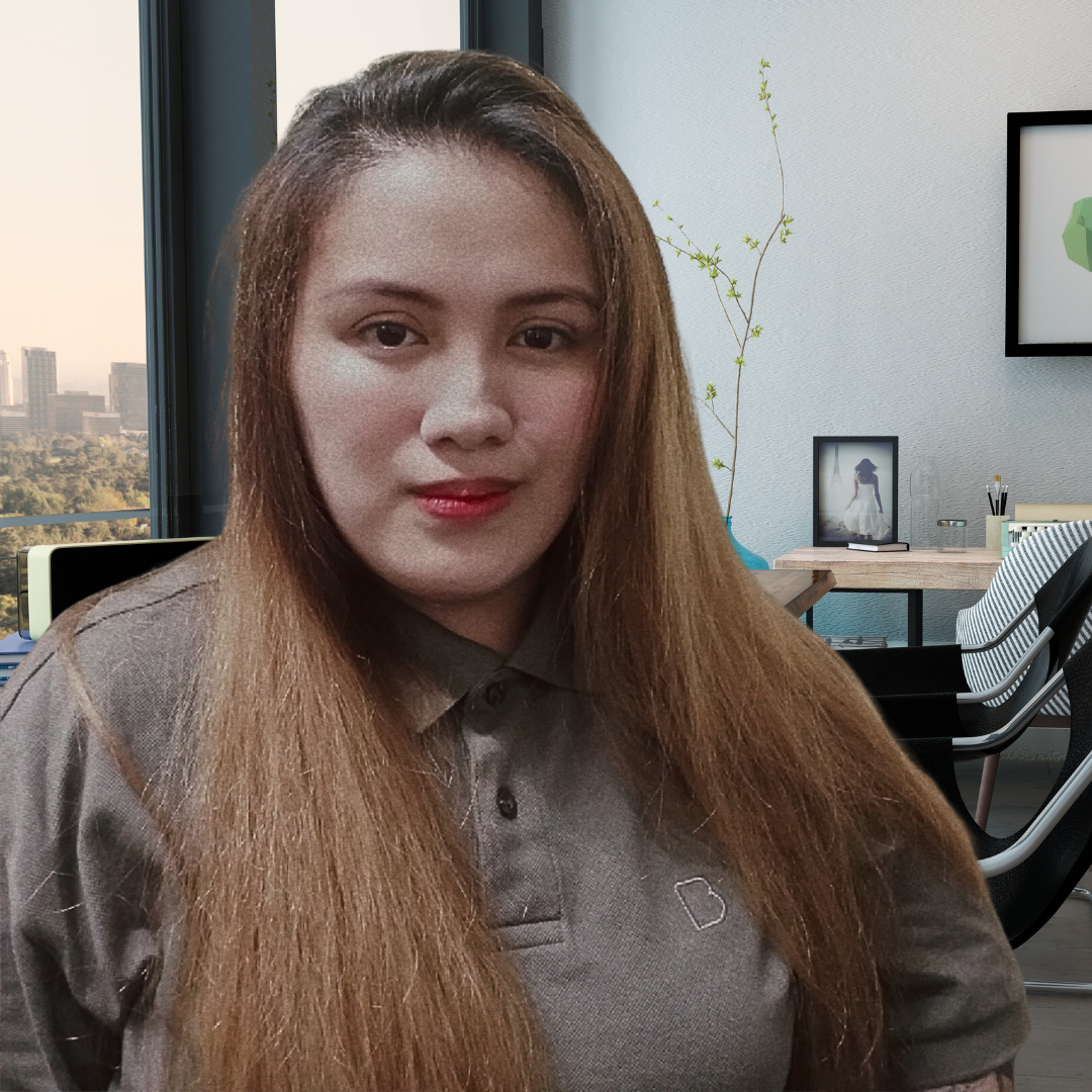 Ann Ballesteros, Physician Outreach specialist with long black hair wearing a gray shirt.