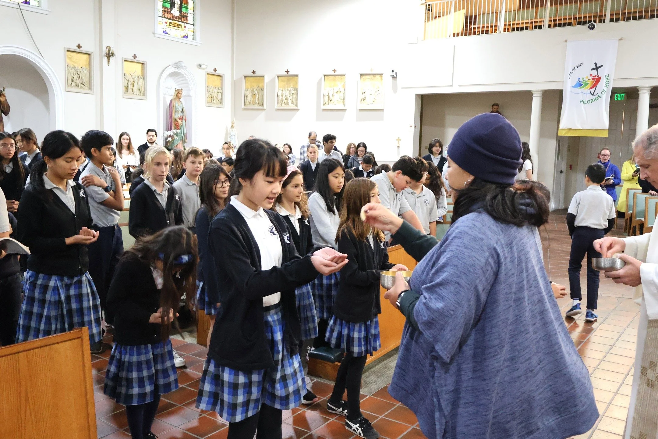 The season of Advent bears several important feast days, and we've been sure to take the time to celebrate them! 

Last week, our school and parish communities attended two Masses-one for the Feast of the Immaculate Conception, and the other for the 