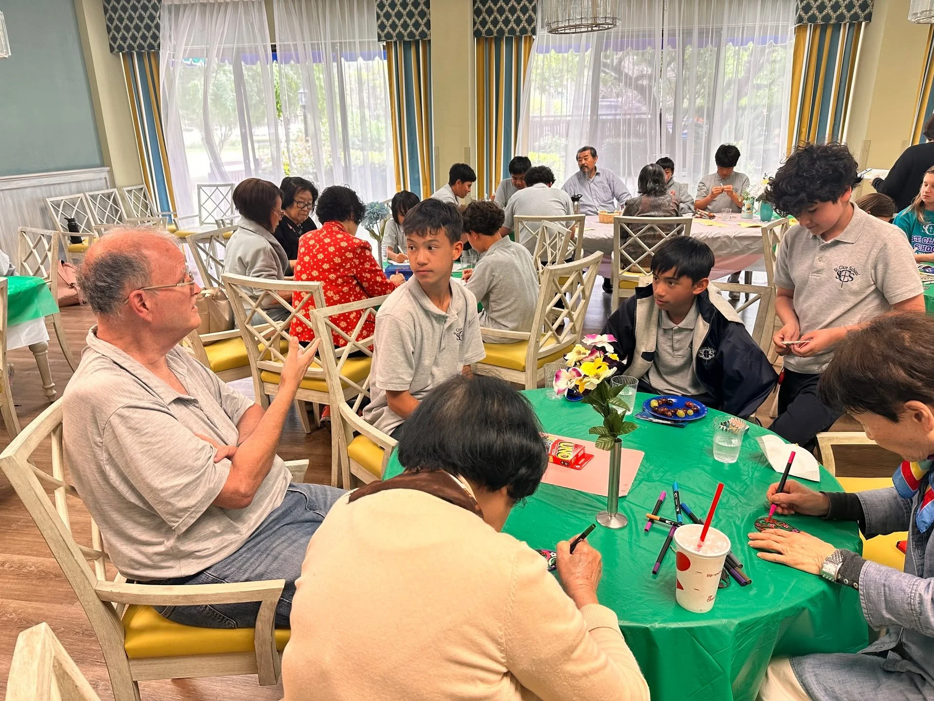 Yesterday, a group of our students took a trip to Liberty Towers Senior Home for a Middle School Service Day! 

These students joined around 25 older adults to engage in conversation, work with arts and crafts, and play games. Some students even used