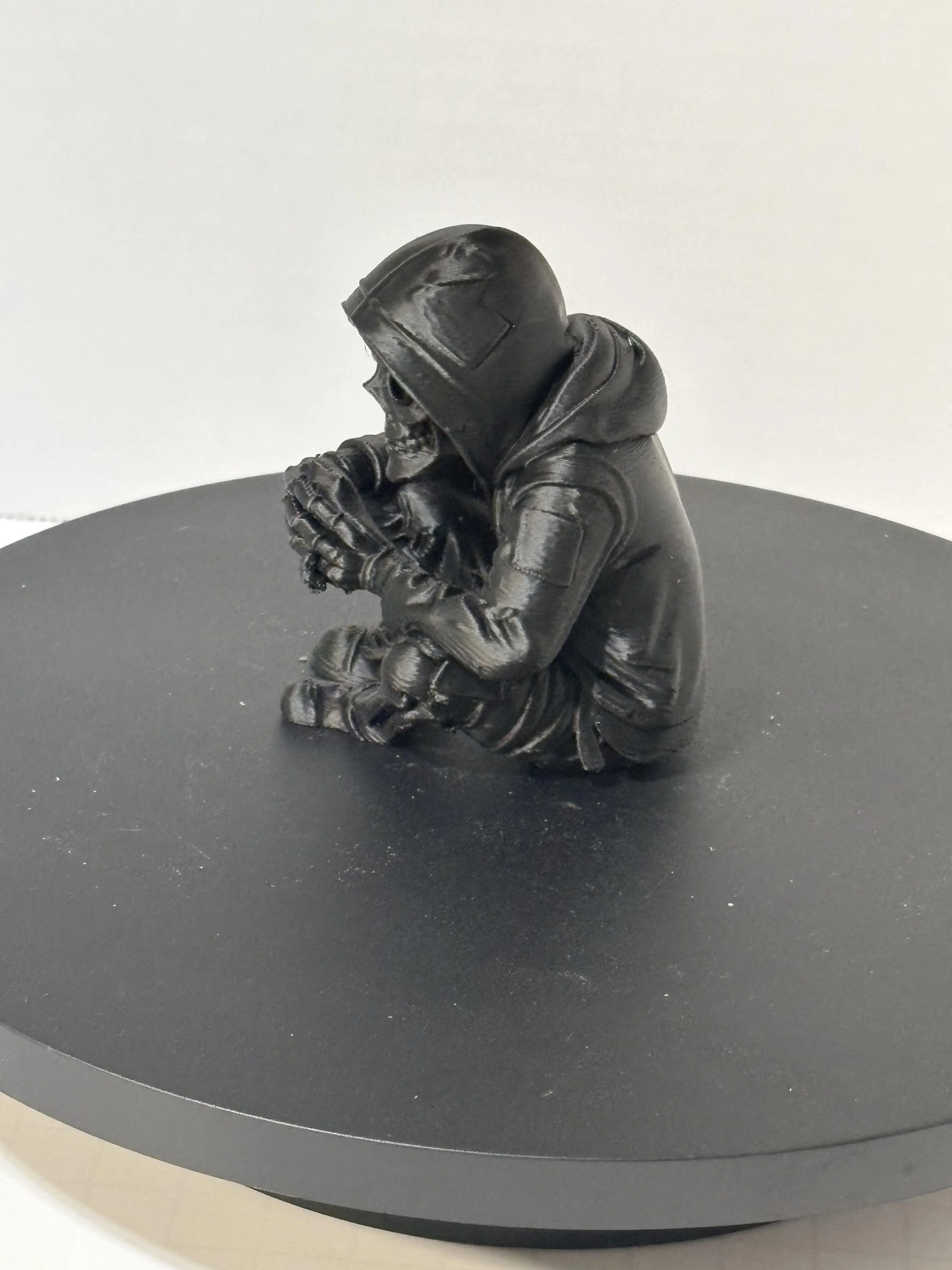 Black hoodie skeleton side view.jpeg