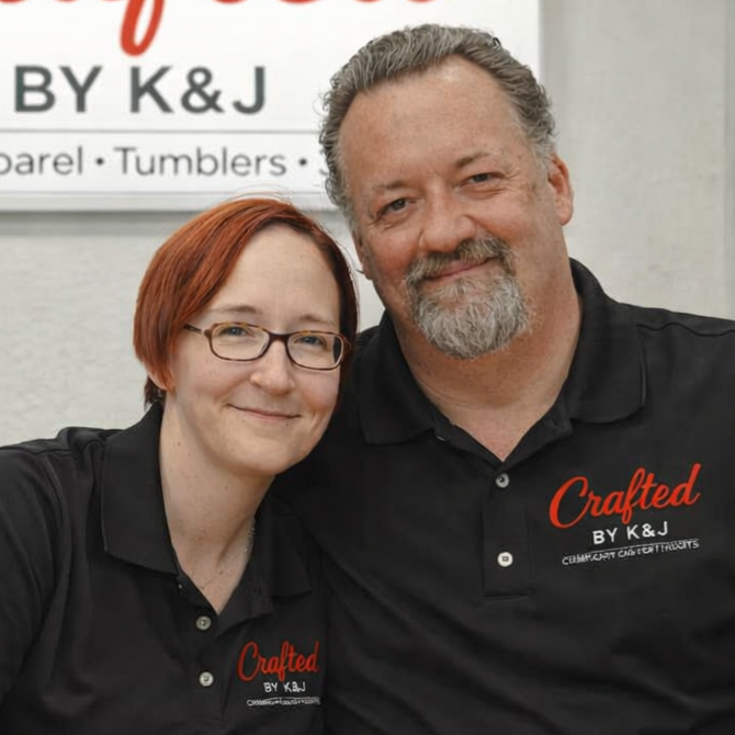 Kevin and Jen, owners and graphic designers for Crafted by K&J