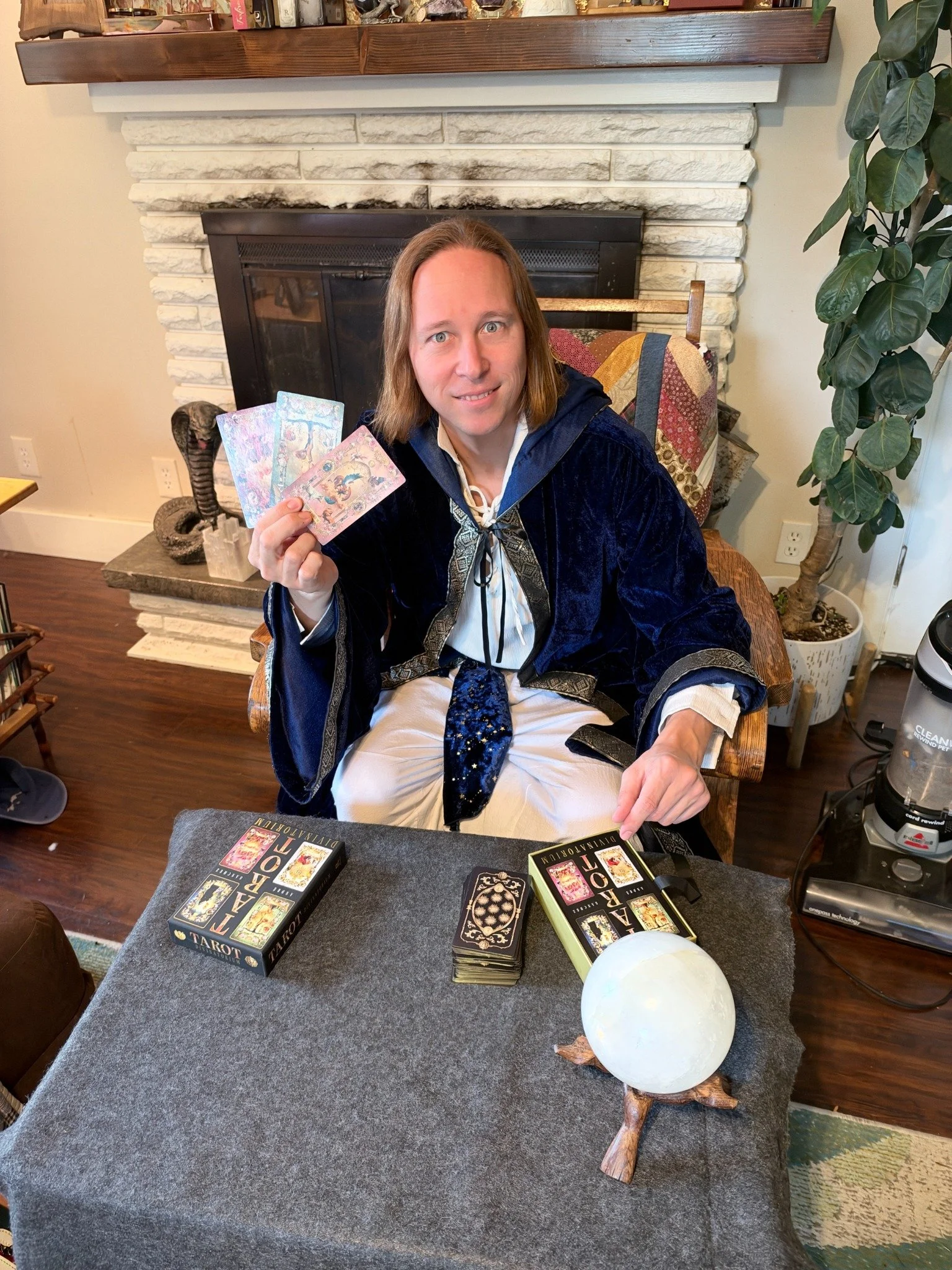Jake Prieto holding tarot cards.