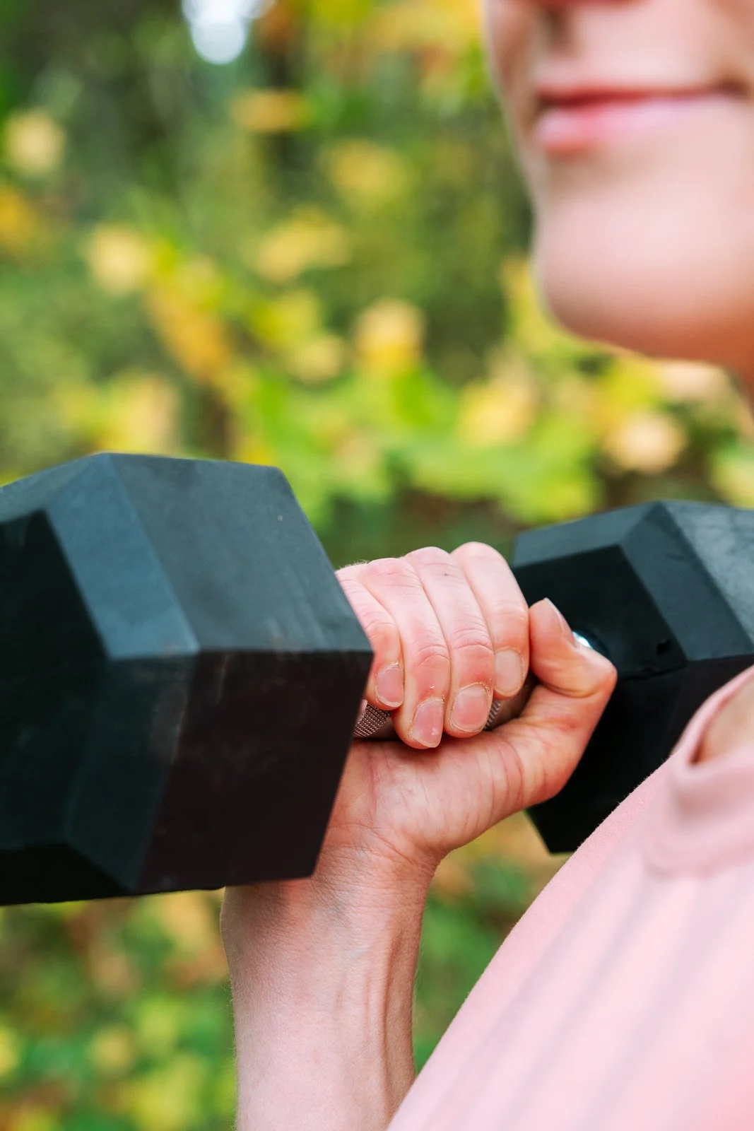 Cayce Clay close up with dumbbell