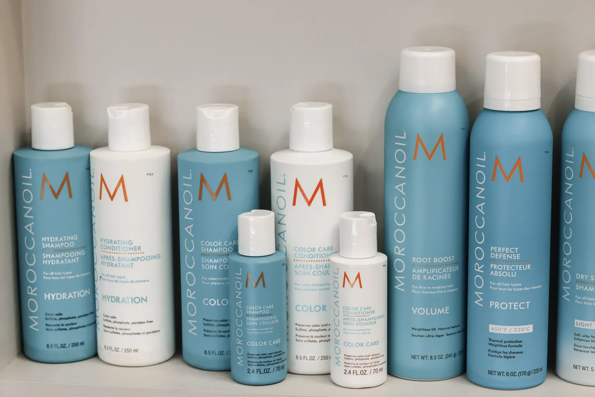 Moroccanoil hair products including shampoo, conditioner, color care, and heat protection hairspray.
