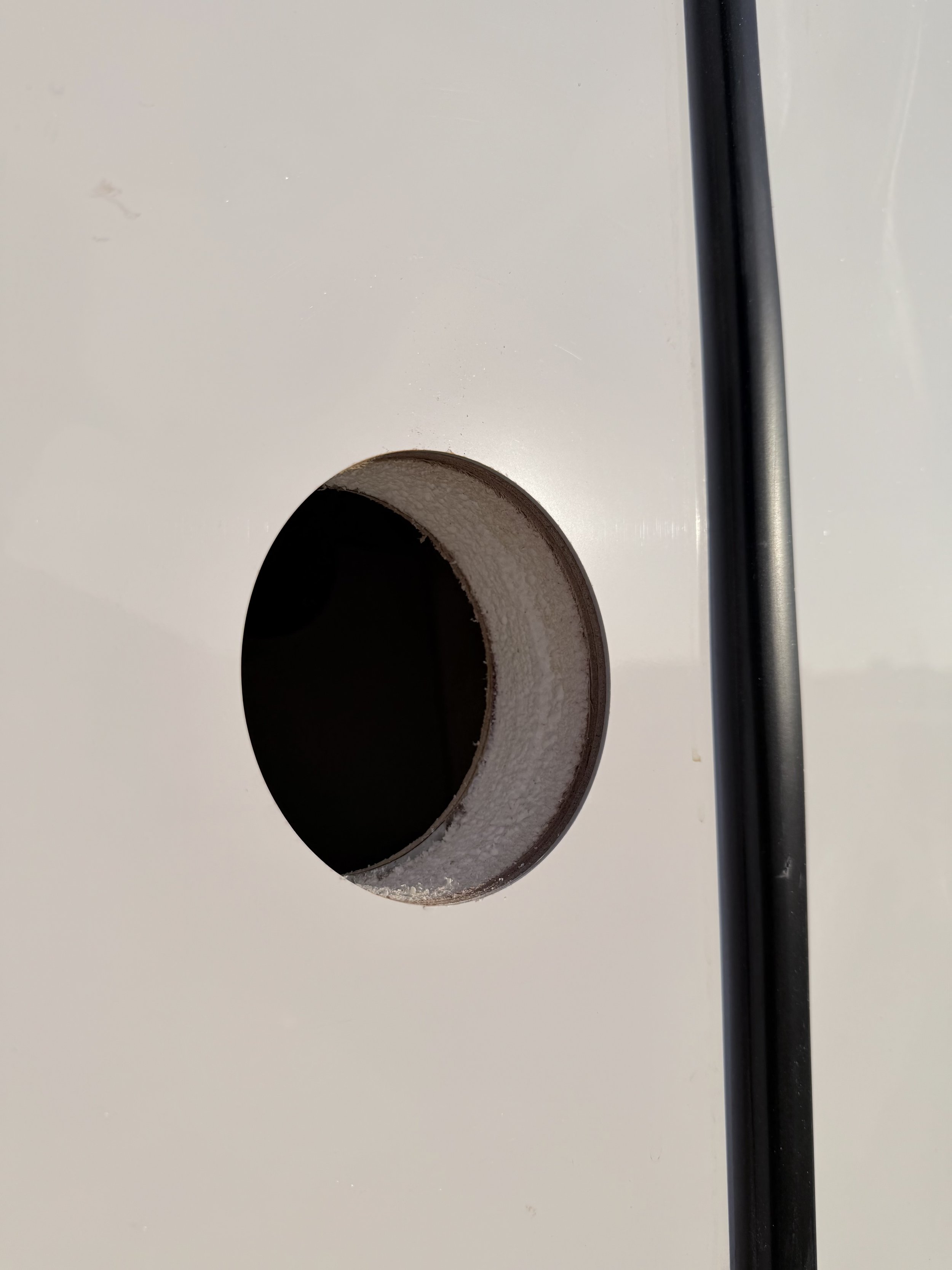 Mobile RV Tech installs vent for RV dryer, appliance.