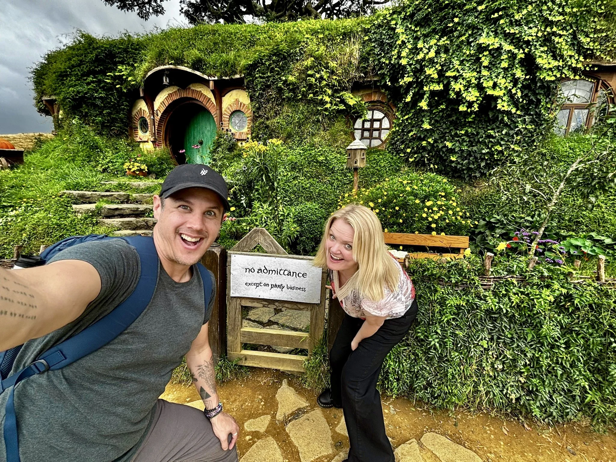 Couple at Hobbiton Movie Set in New Zealand.