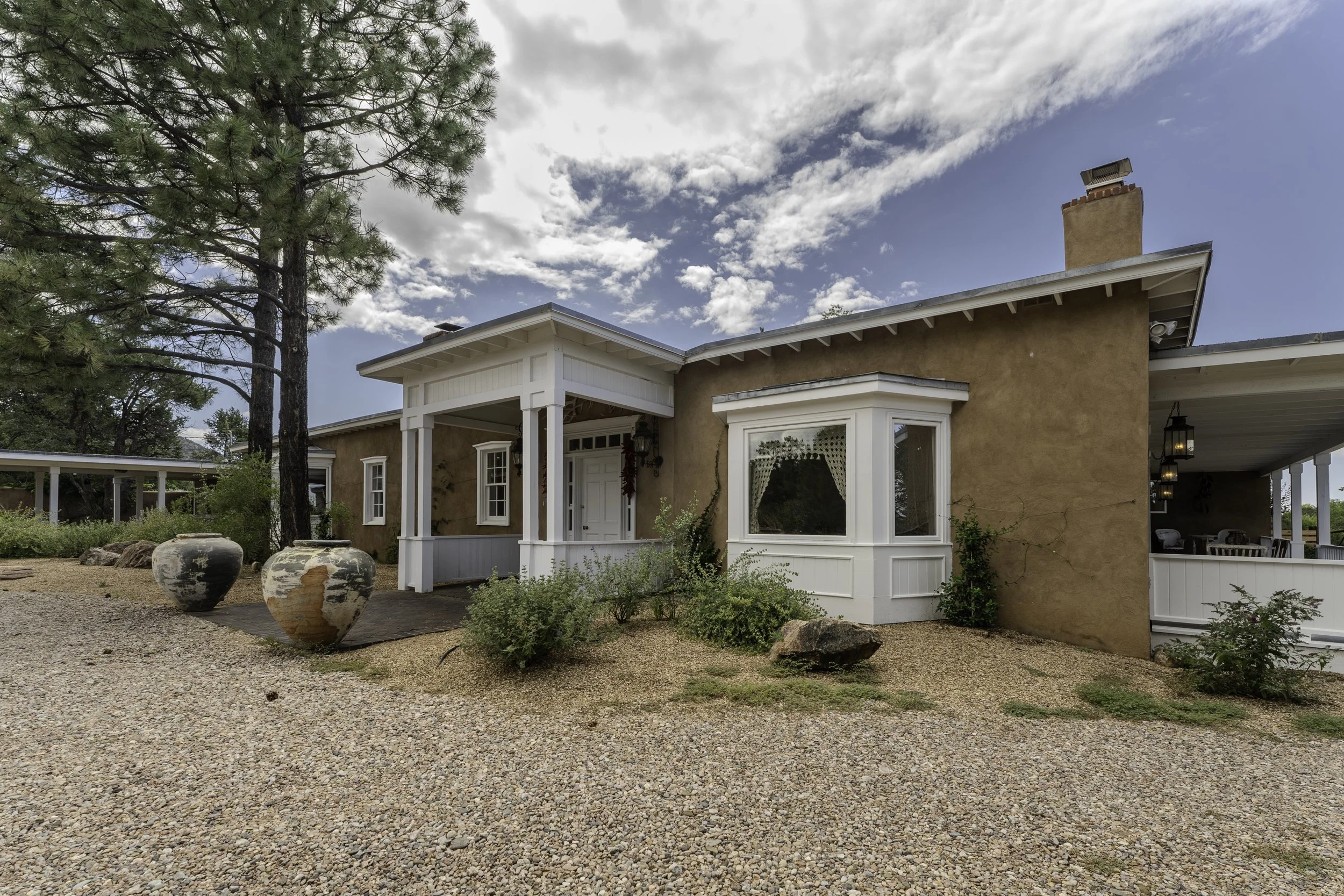 Front of Home with Side Covered Patio 