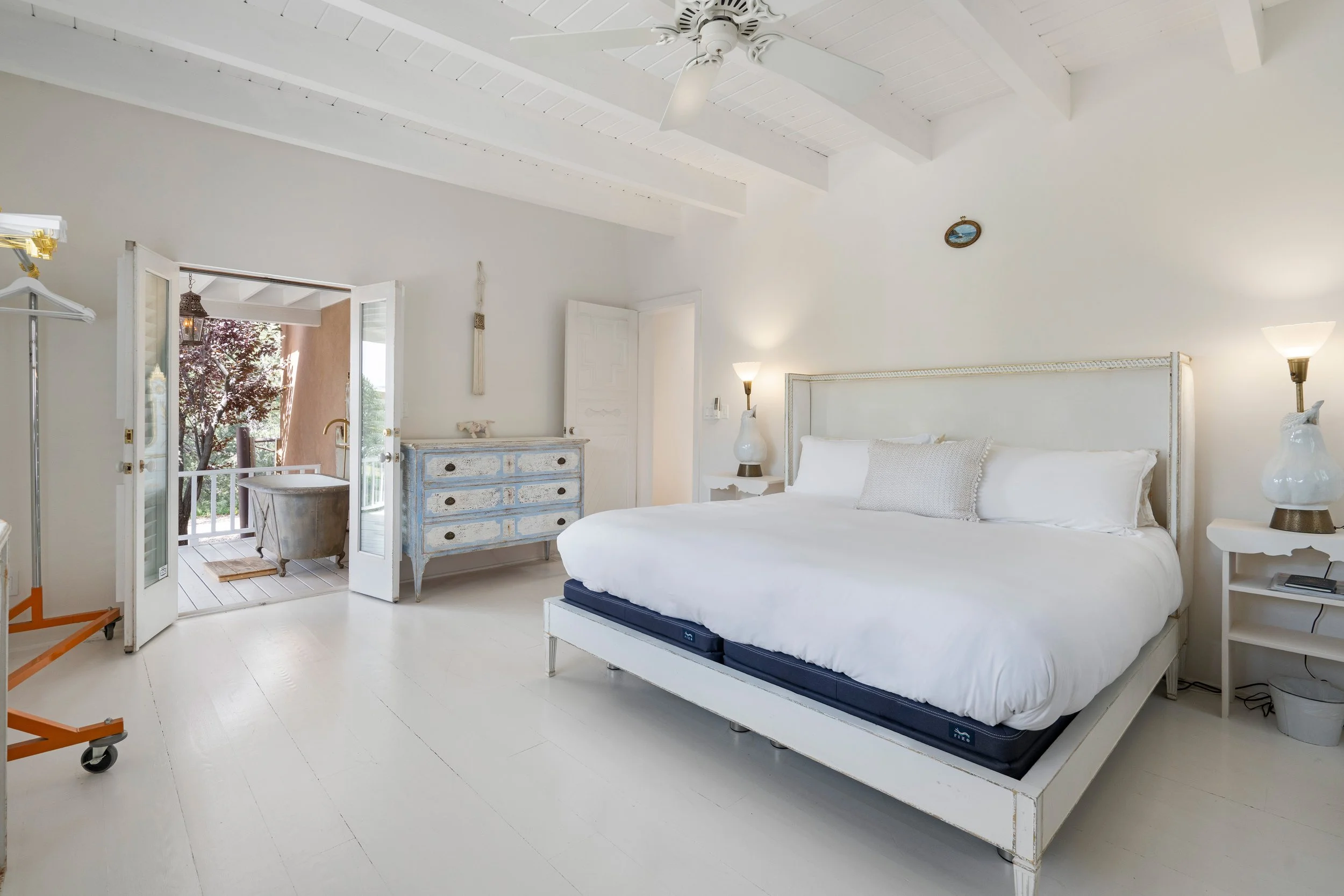 Primary Bedroom with King Bed and Private Covered Porch and Seasonal Tub