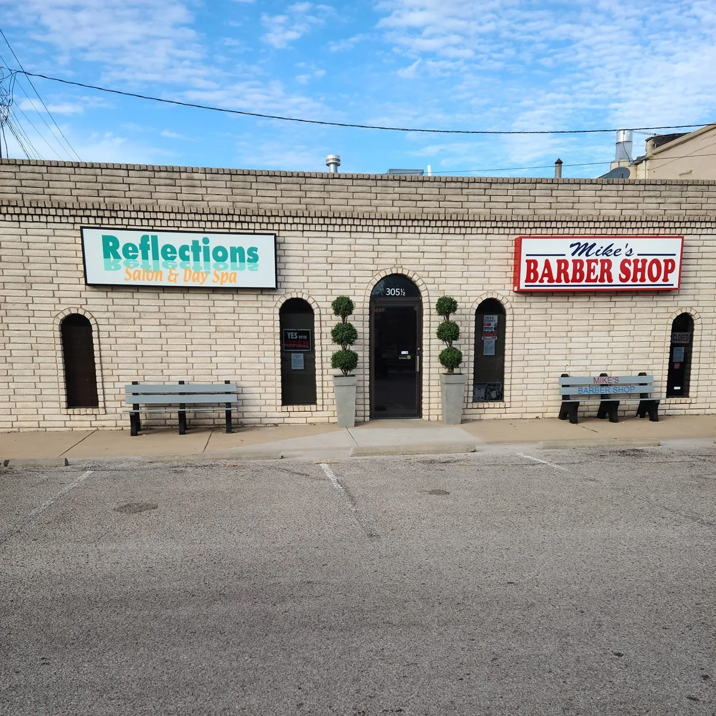 Mike's Barber Shop and Reflections Salon and Day Spa: Your complete destination for grooming and relaxation.