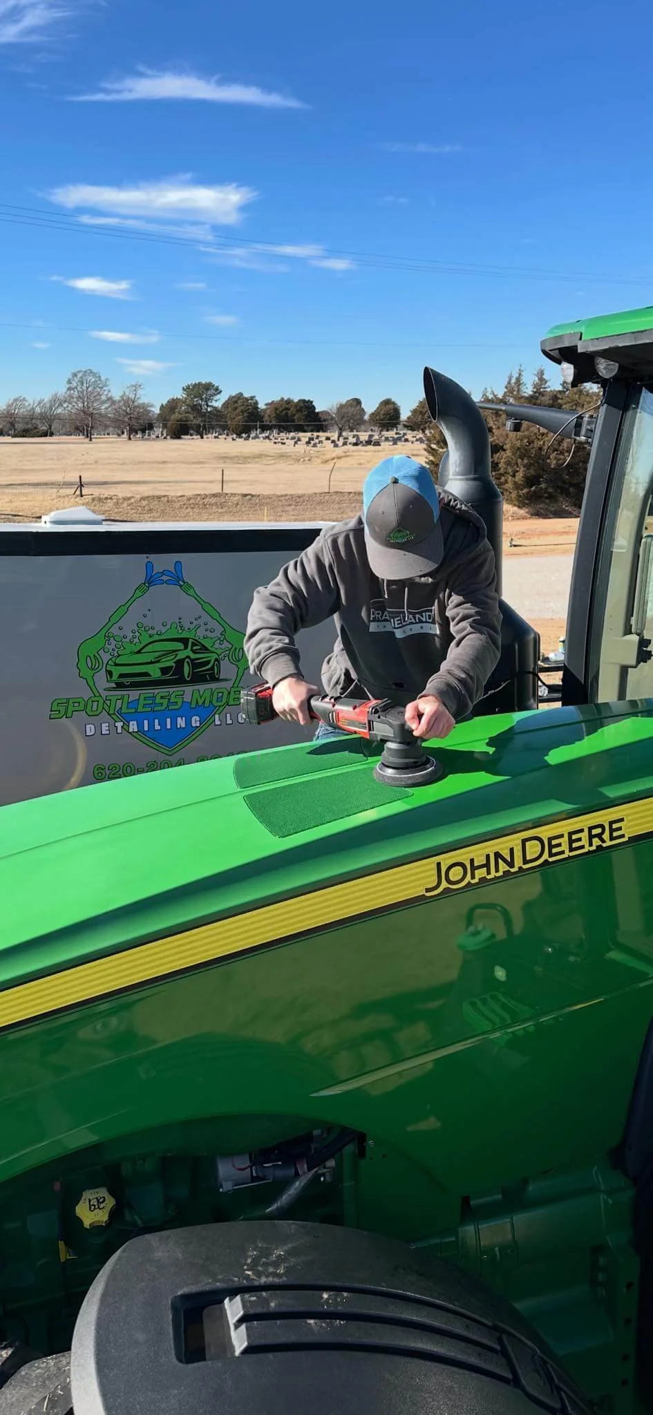 manBuffingTractor.jpg