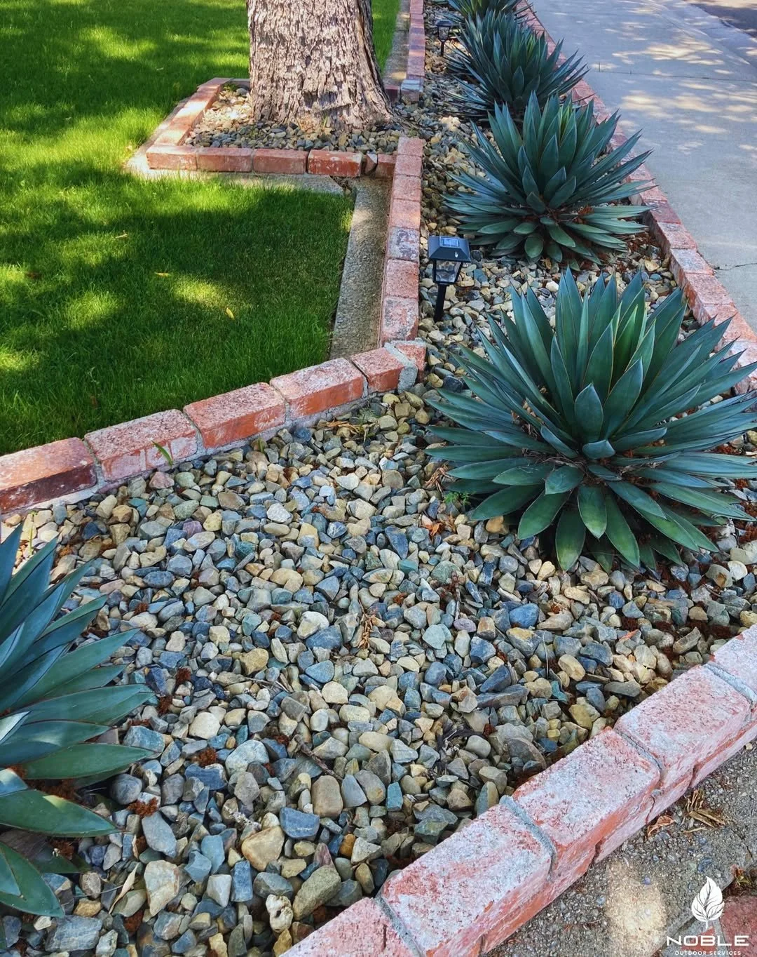 rock and hardscape installation for weed control
