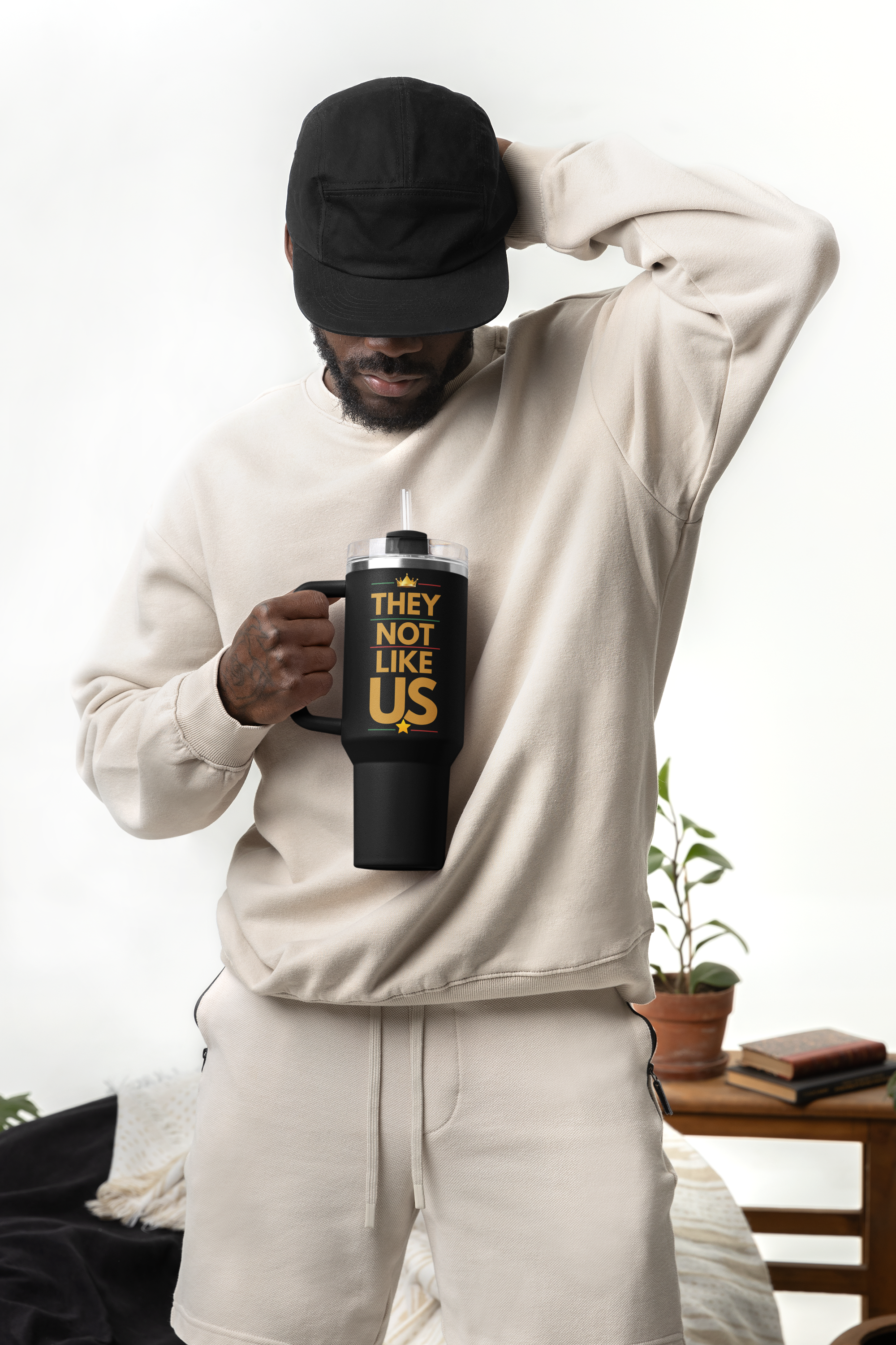 mockup-of-a-bearded-man-holding-a-sublimated-stanley-tumbler-m40298.png