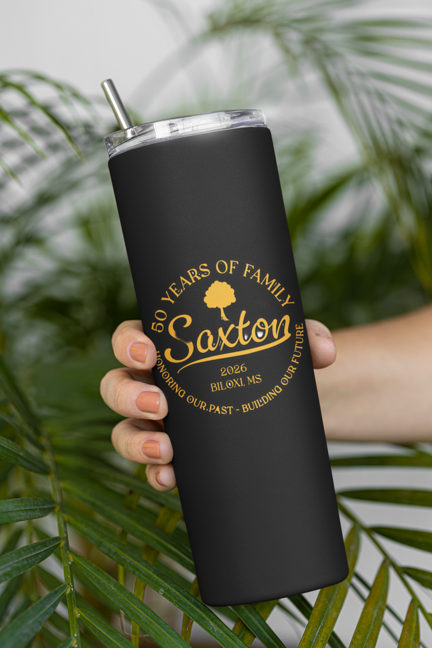 mockup-of-a-woman-holding-a-skinny-tumbler-featuring-palm-leaves-in-the-background-m21468 (1).png