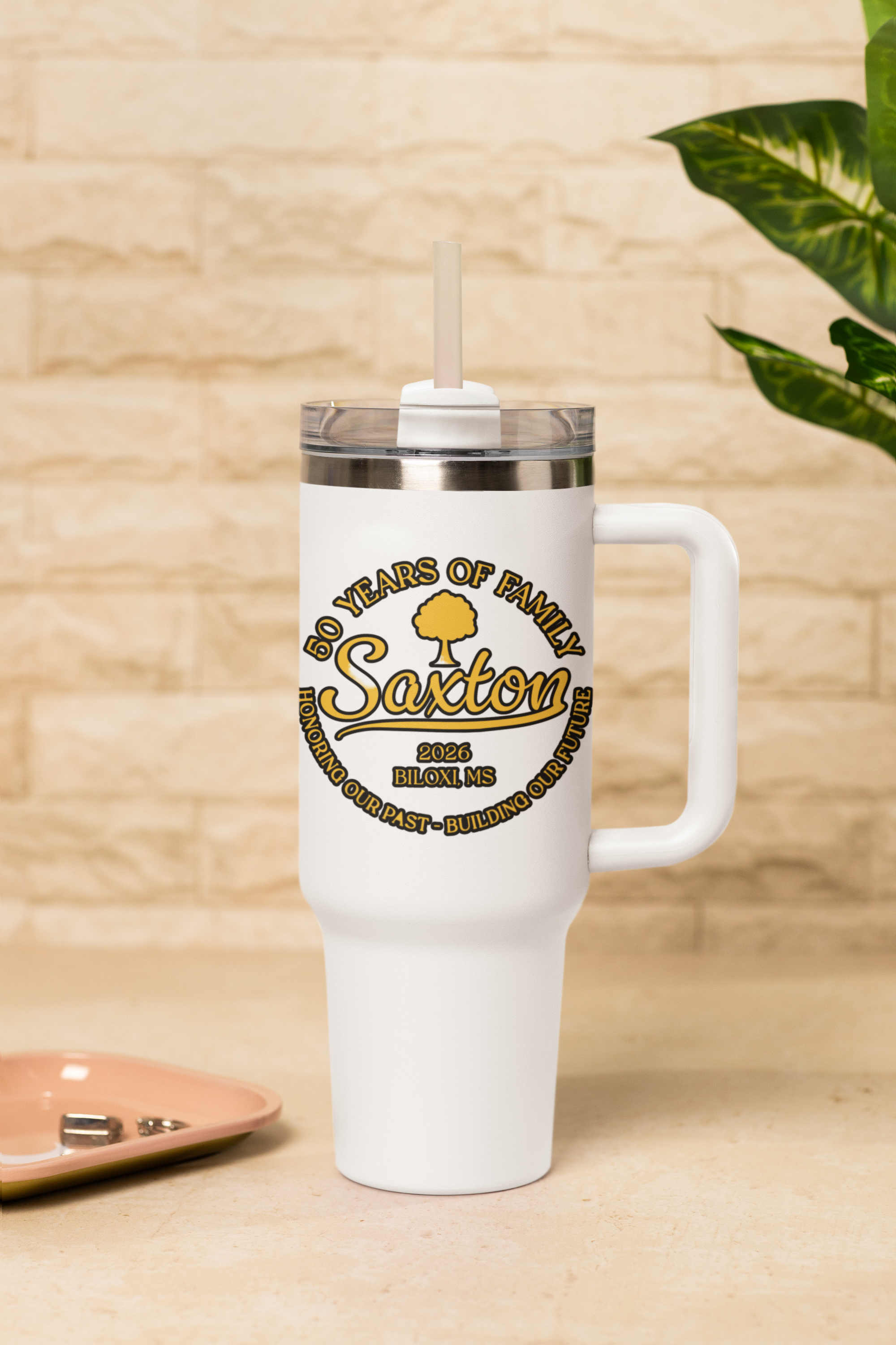 mockup-of-a-sublimated-stanley-tumbler-placed-on-a-table-with-a-plant-m54042.png