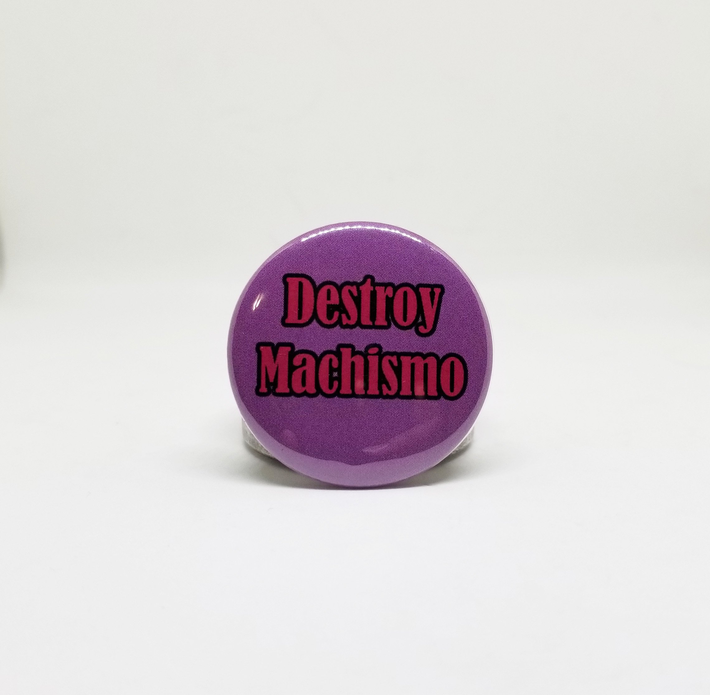 Destroy machismo button pin