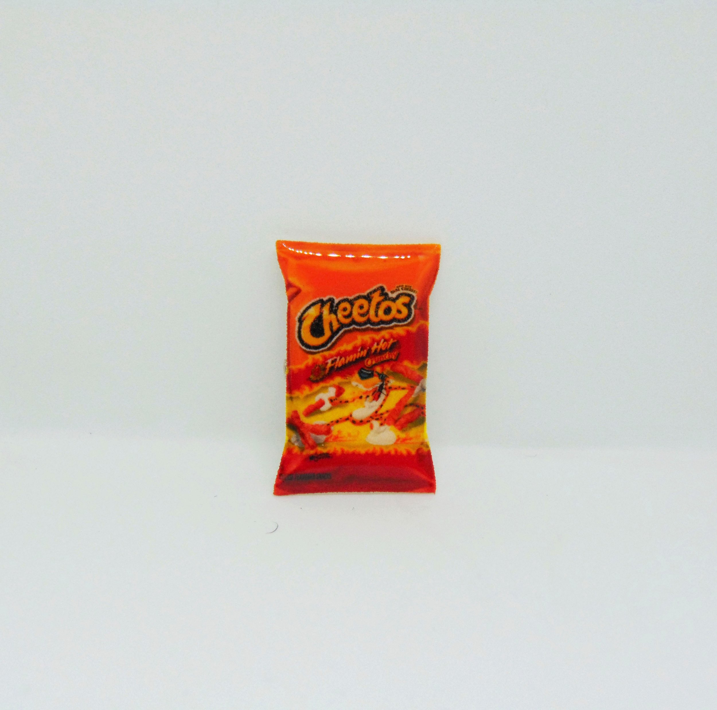 hot cheetos pin or magnet
