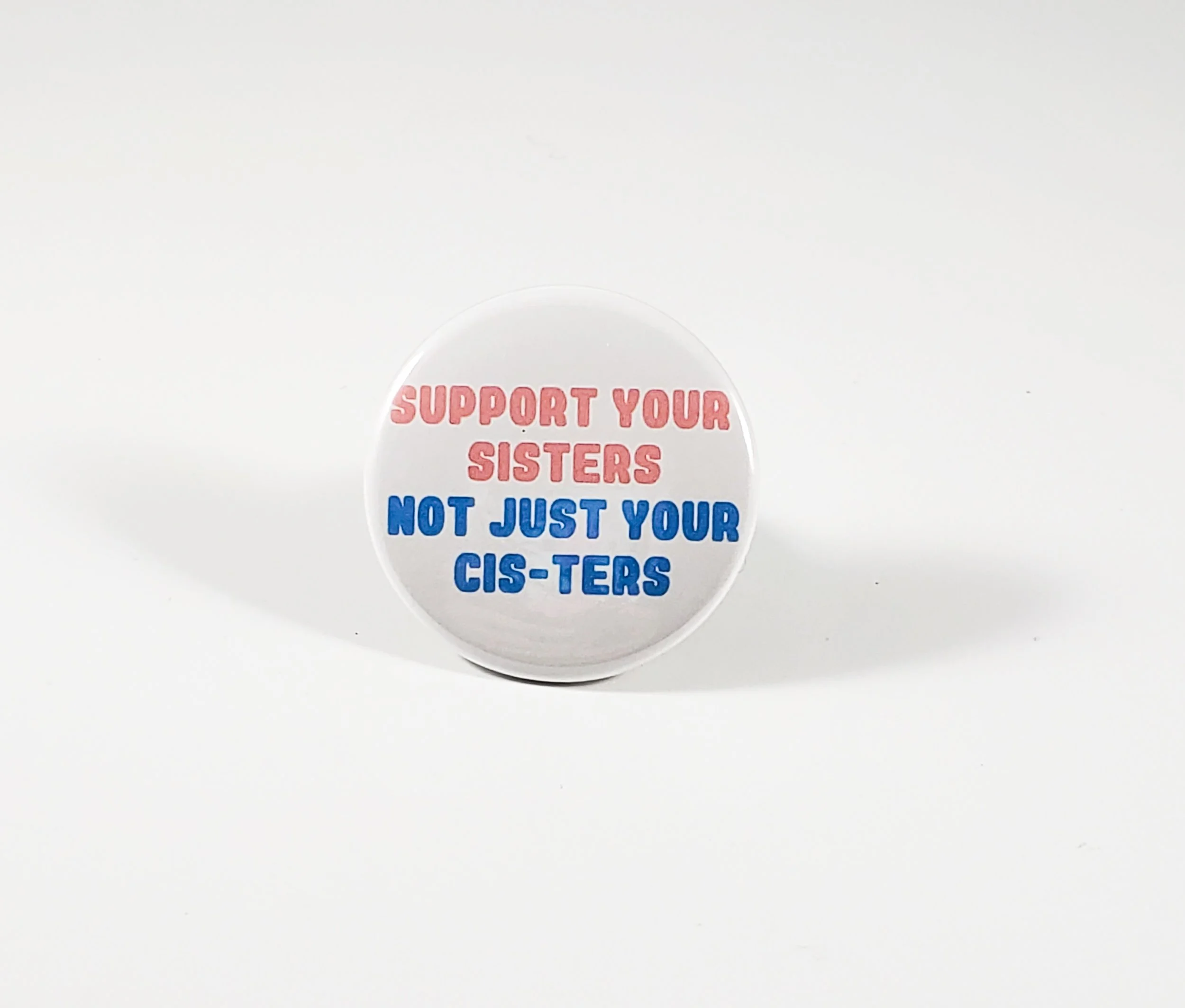 Support your sisters not just your cis-ters button pin