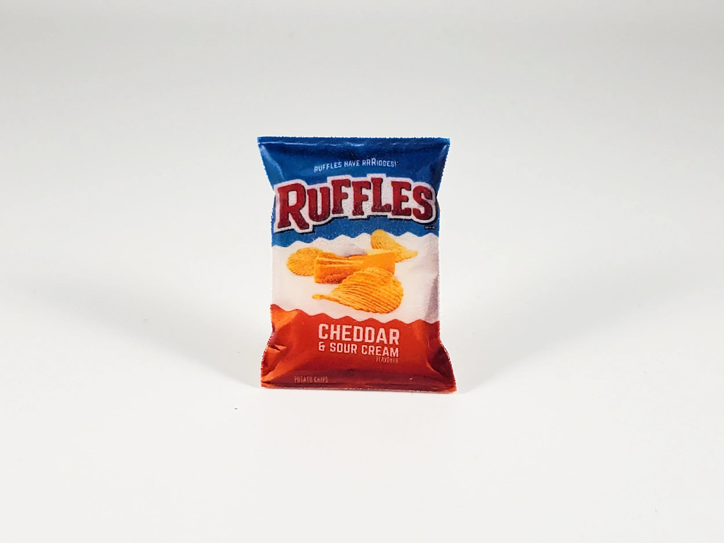 Ruffles cheddar and sour cream pin or magnet