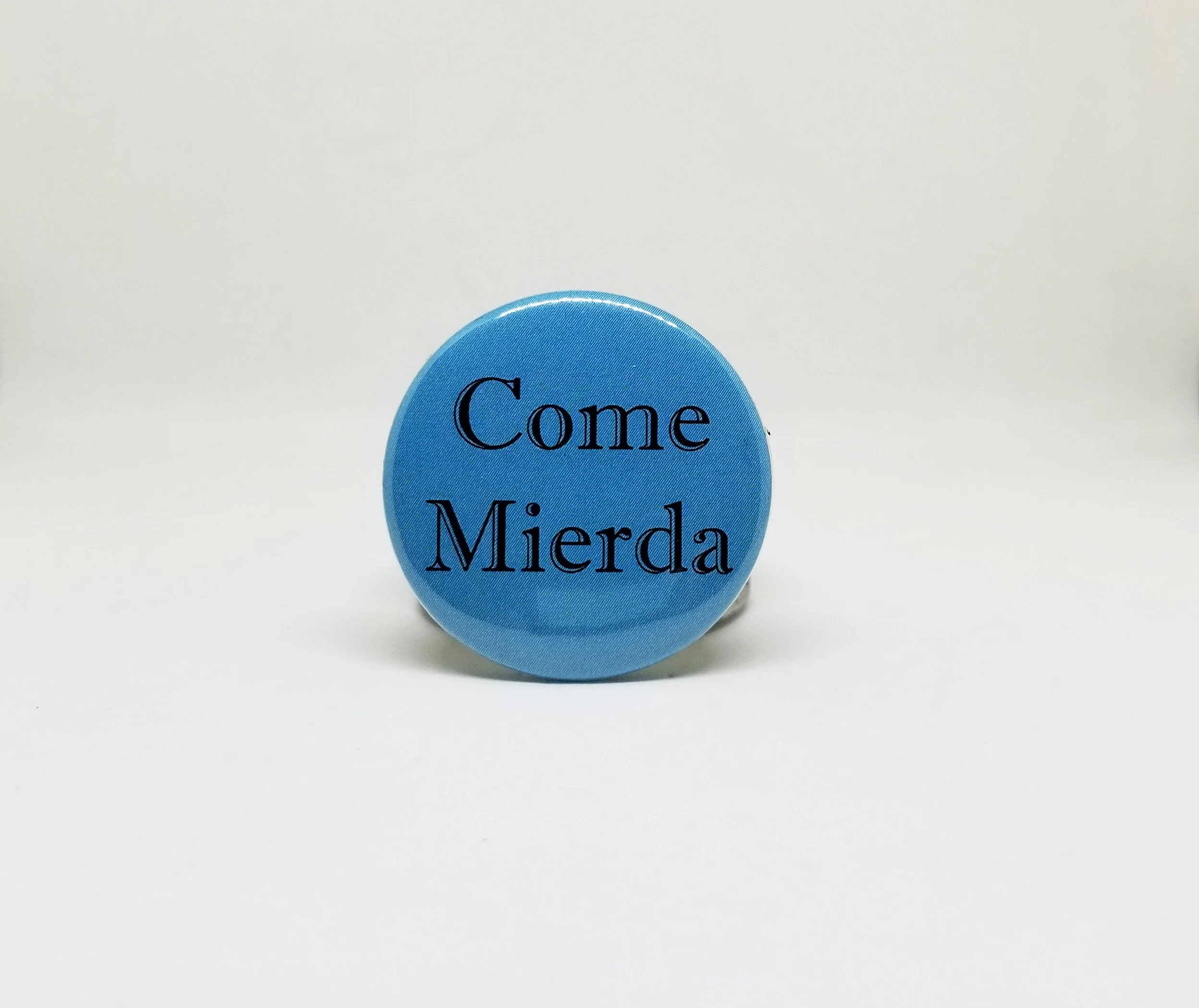 Come mierda button pin