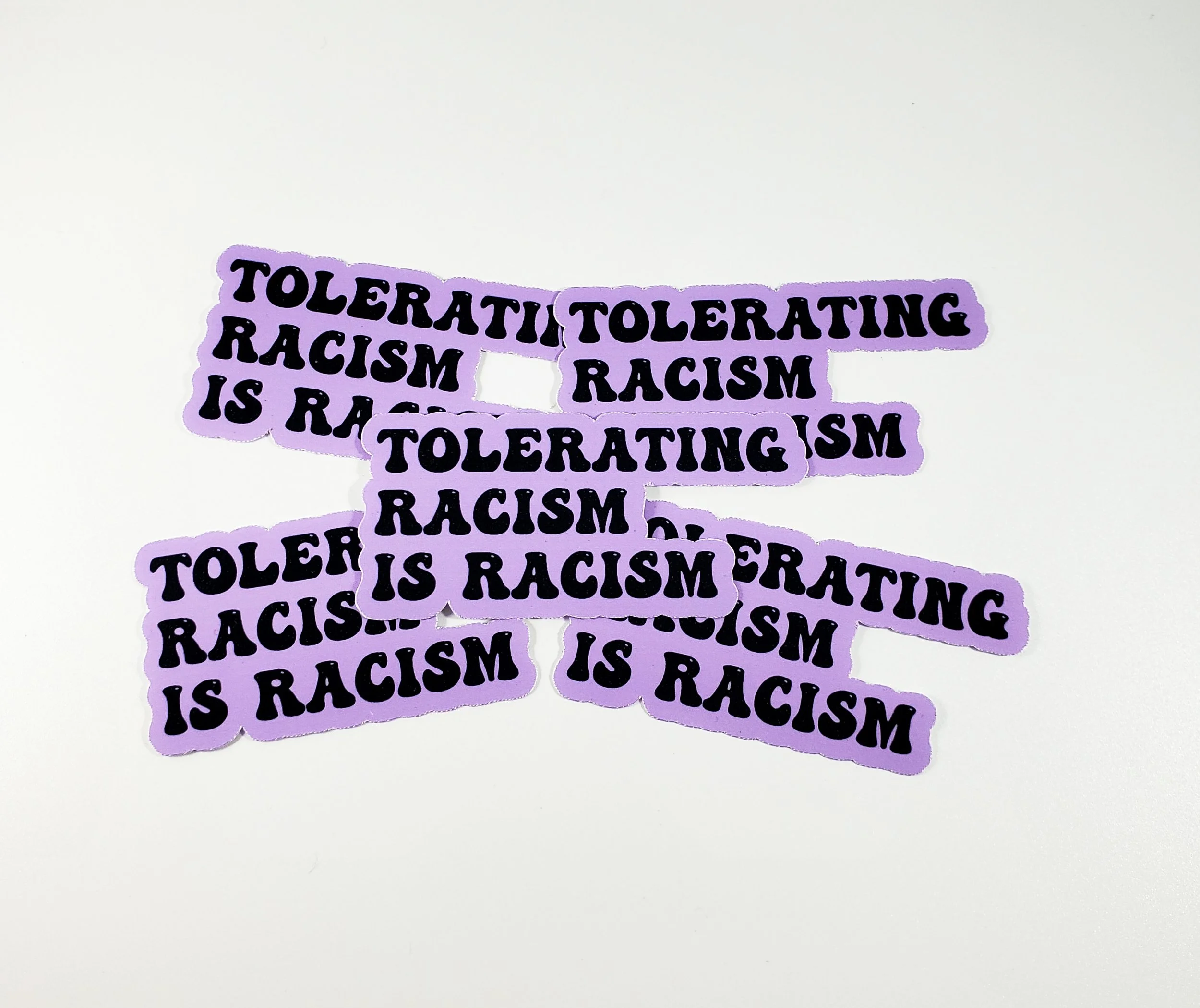 Tolerating racism is racism sticker