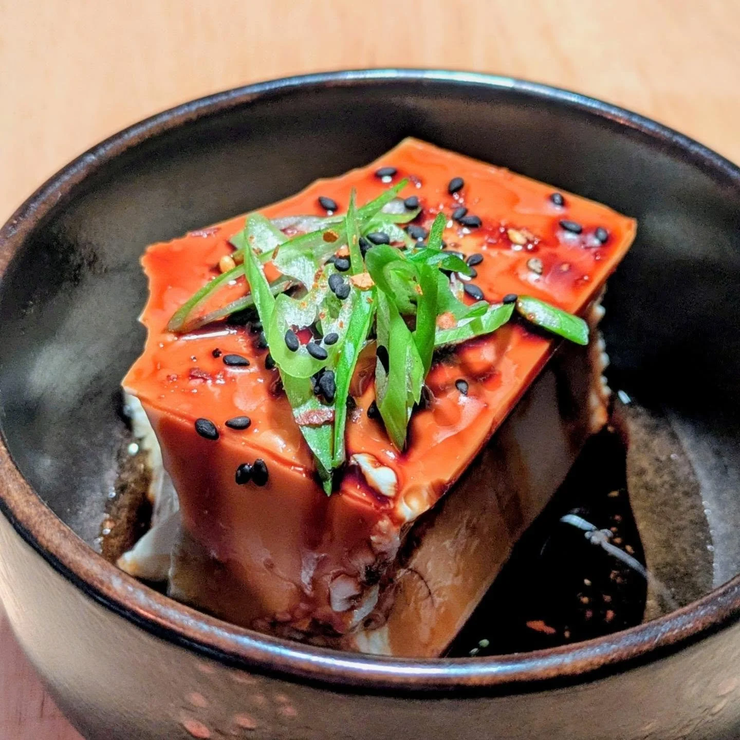 Sometimes after a long day of cooking for other people the thing I want is just simple and flavorful to make but is still pretty enough to make me feel like I've put care in. Soft tofu with dark soy sauce, black vinegar, sesame oil, scallions, black 