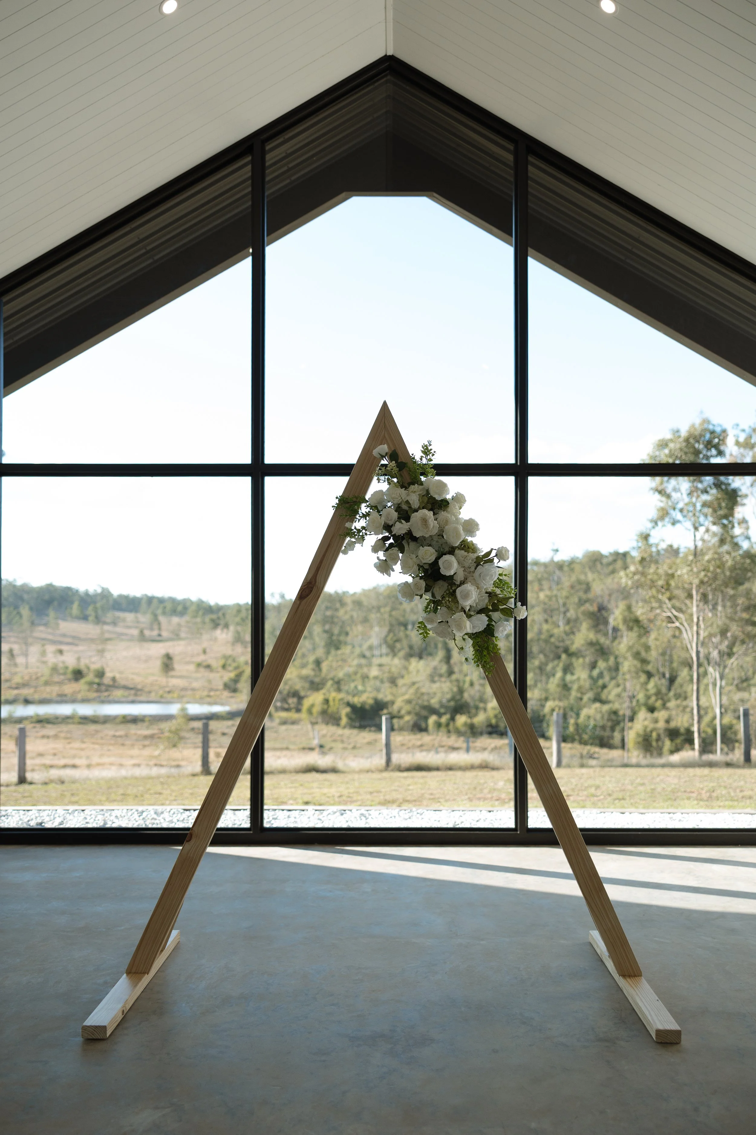 prop hire Hervey Bay, triangle arbour, wedding ceremony hire pieces