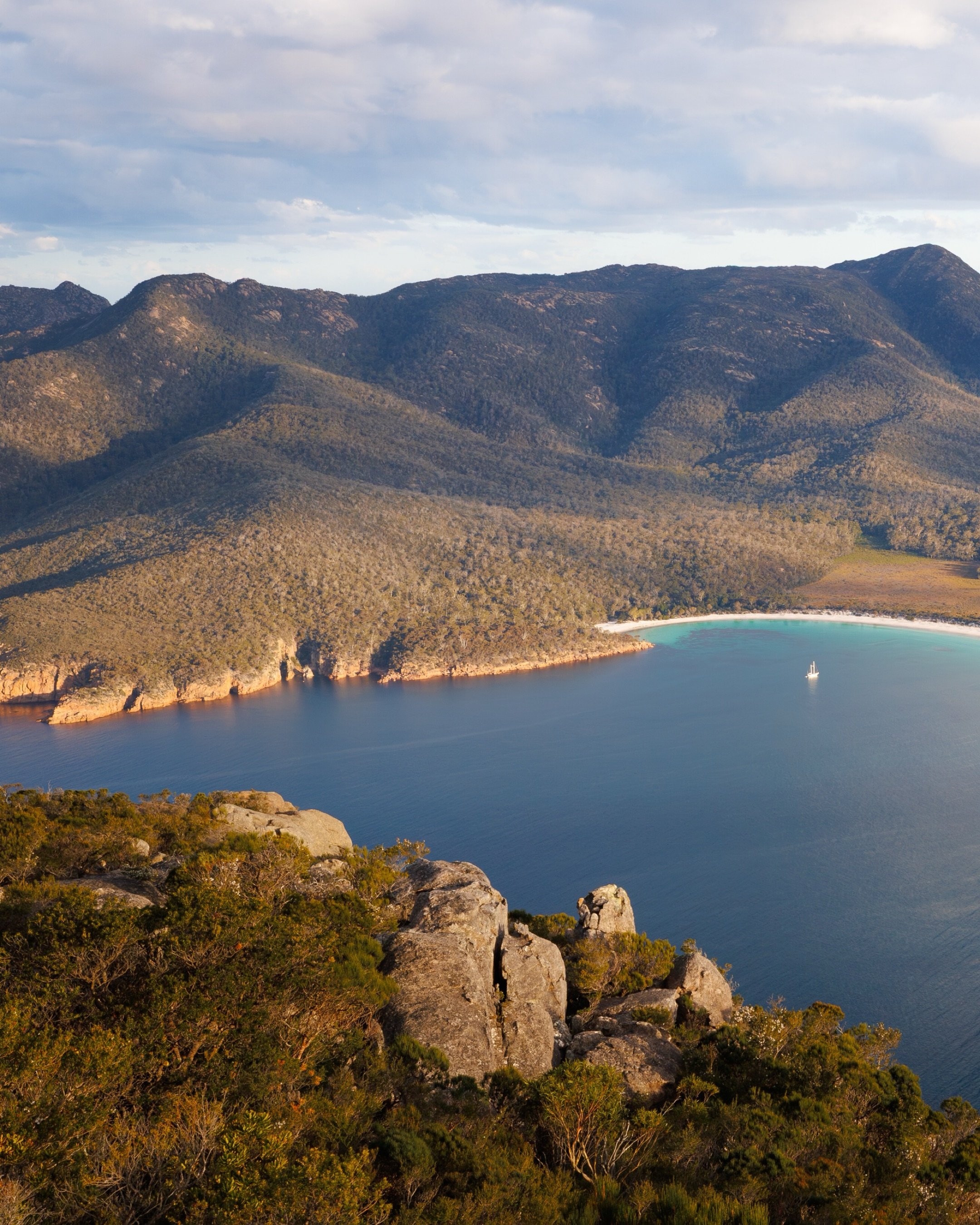 One of many photos taken at the top of Mount Amos Located in Tasmania in Freycinet National. The famous WineGlass Bay. 
Climbed this in the evening, took a couple timelapses and came down at about 8:00pm. Auroras were forecast but unfortunately the F