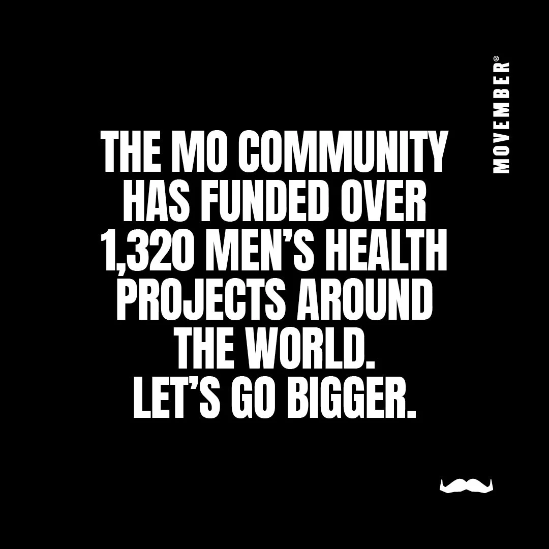 Black background with white bold text stating, 'The MO Community has funded over 1,320 men's health projects around the world. Let's go bigger.' The word 'MOVEMBER' is written vertically on the right side, and there is a small white mustache graphic
