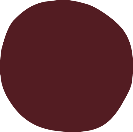 Ein roter, runder Gegenstand auf schwarzem Hintergrund