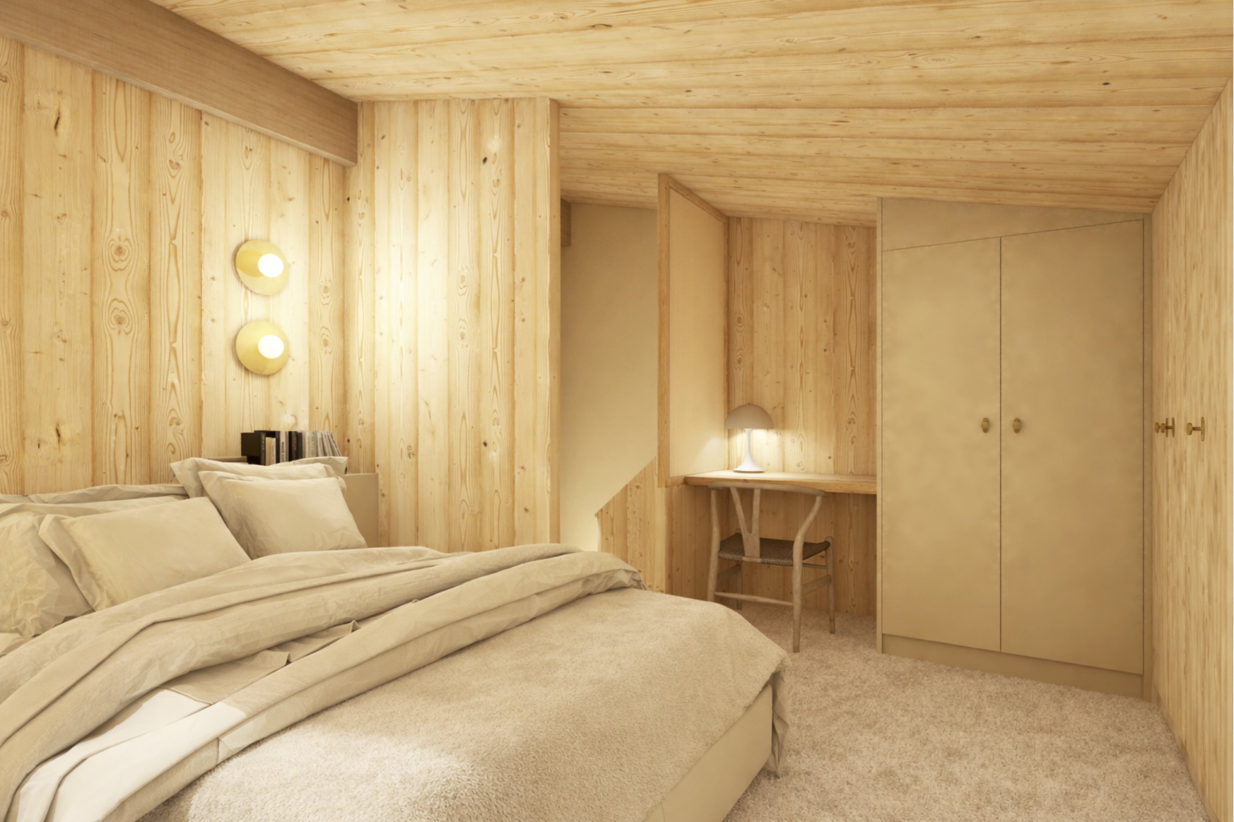 Dans cet appartement en duplex situé à Megève, cette seconde proposition d’aménagement de la chambre offre une interprétation plus spacieuse et confortable de l’espace nuit.
Pensée pour maximiser la sensation de volume, cette version privilégie une c