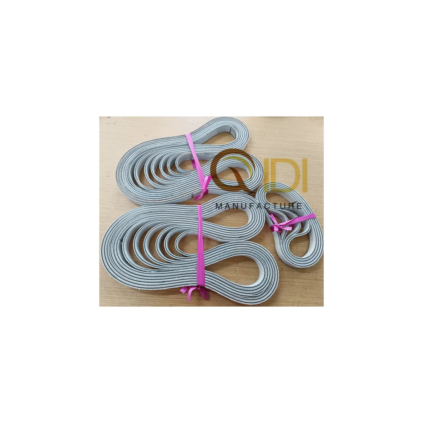 Double sided leather conveyor belt for folder gluer machines and paper feeding systems