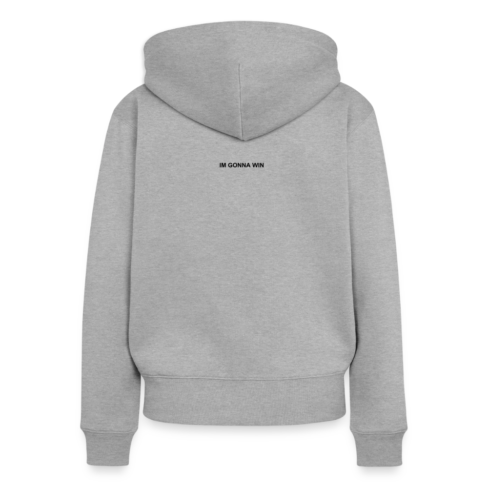 En grå hættetrøje med teksten 'IM GONNA WIN' på ryggen.