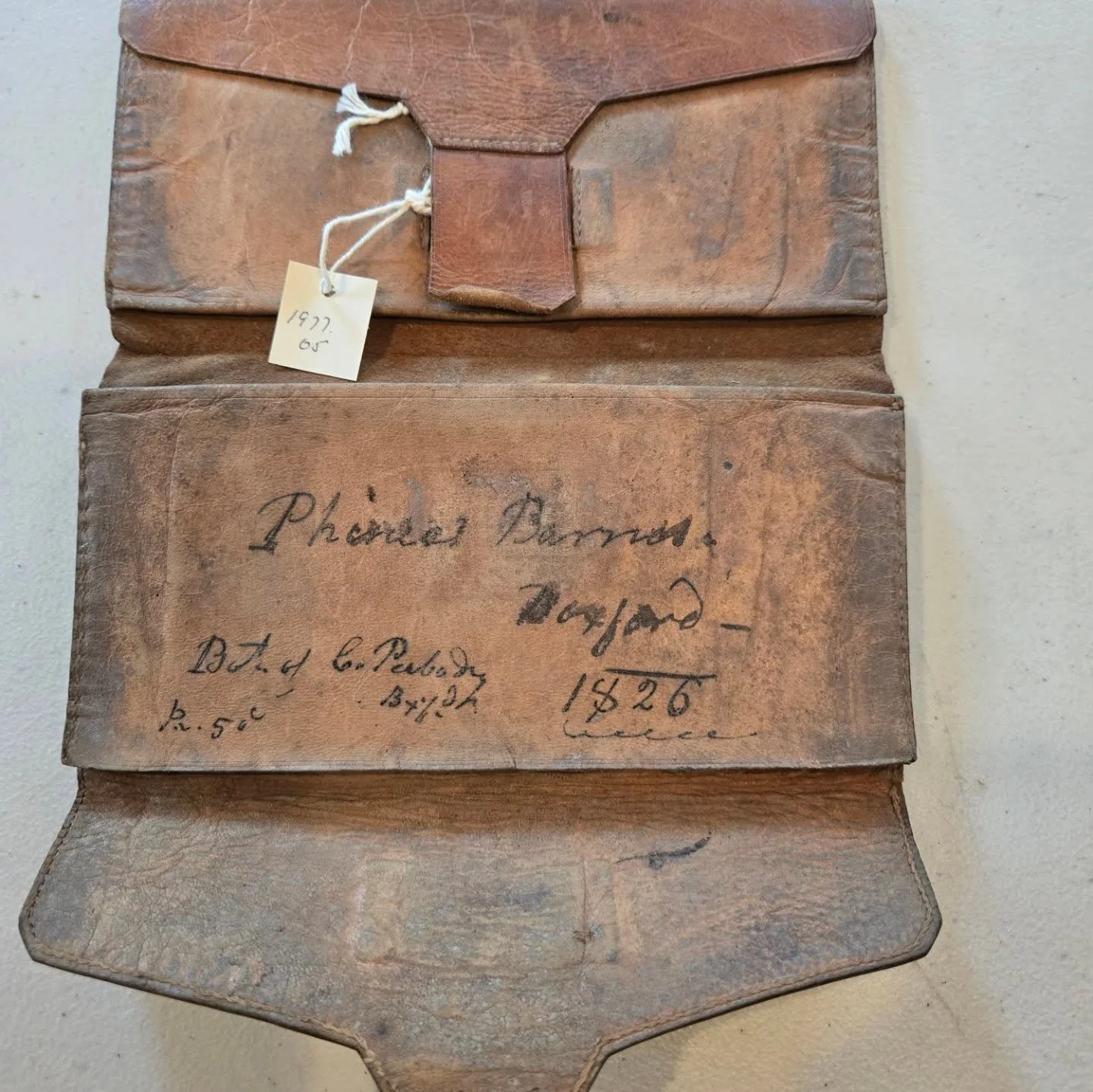 Love it when people label objects! This wallet was owned by Phineas Barnes of Boxford and it says &quot;bot of C. Peabody Bxfd pa. 5 c 1826&quot; [bought of C. Peabody Boxford, paid 5 cents in 1826]. Phineas lived from 1780-1856. He made his home at 
