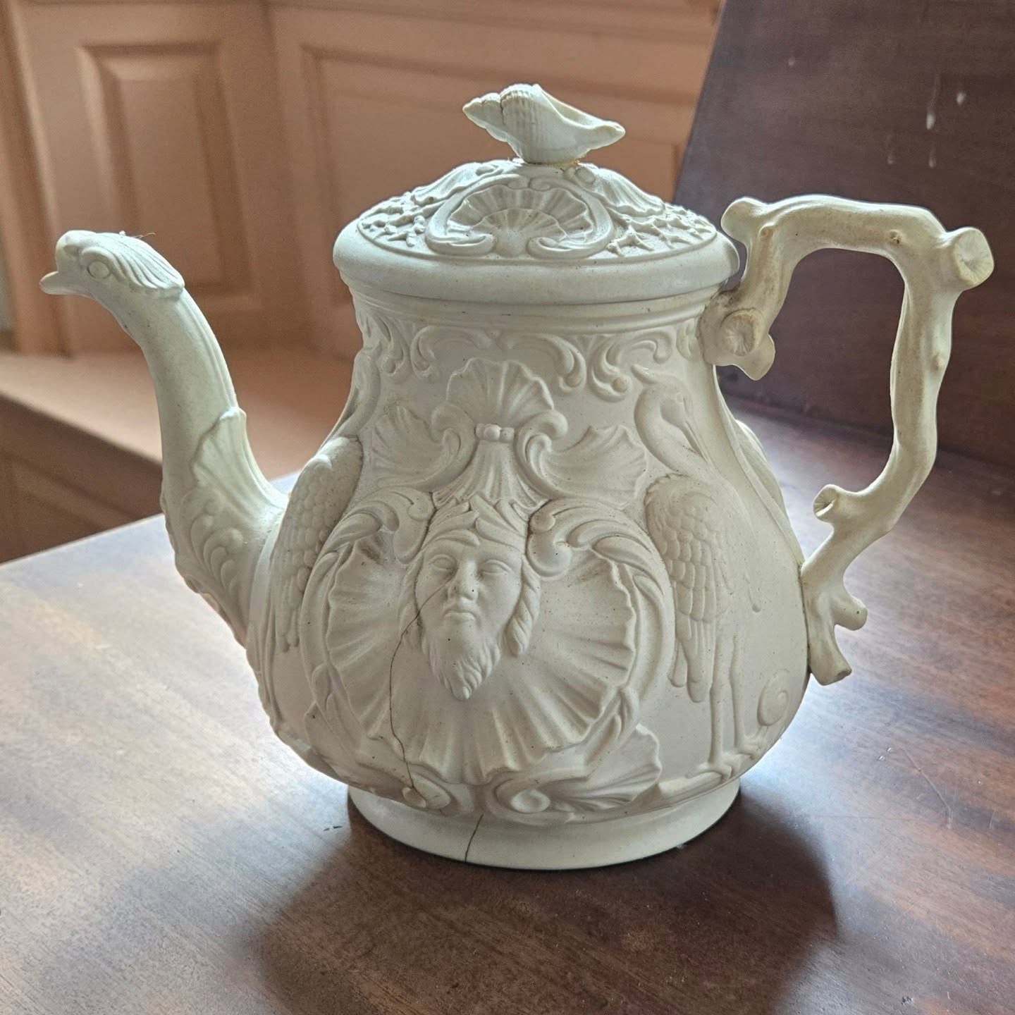 This is one of my favorite objects in the Historical Society's collection. It is an amazingly intricate and imaginative Staffordshire teapot and most likely dates to the mid-1700s. The serpent-head spout was actually an especially popular teapot feat