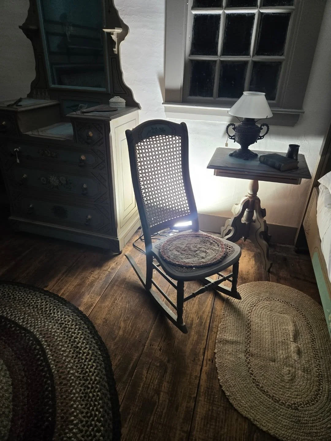 We were testing out some lighting at the Holyoke-French house the other night, and i love how eerie this photo turned out. This space is in a child's bedroom, and is actually supposed to feel warm, like a parent might sit here reading a bedtime story