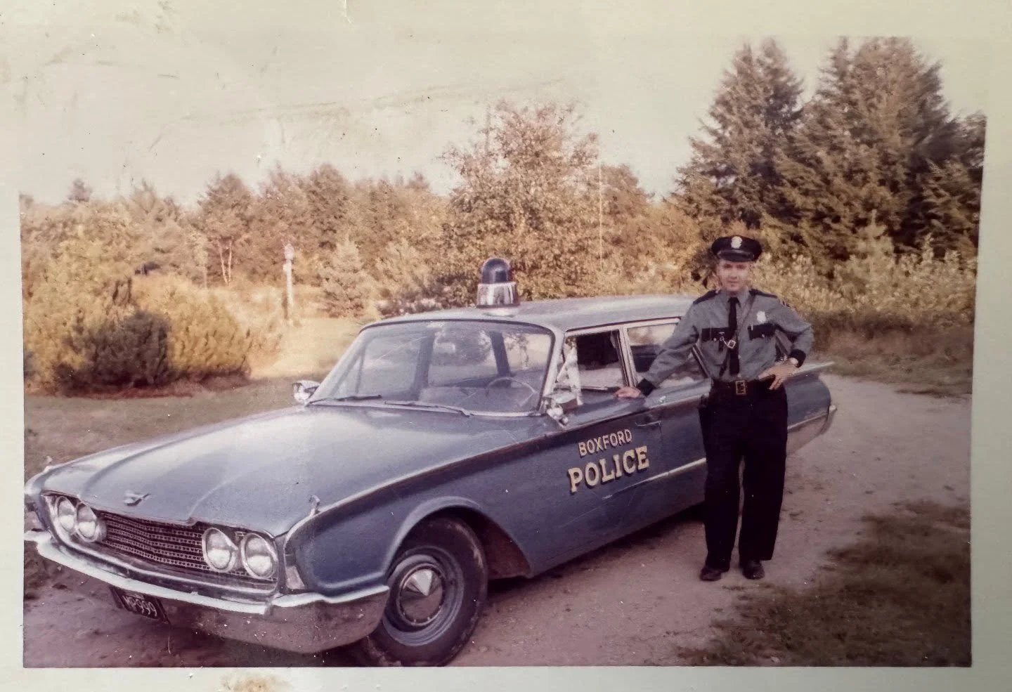 This fantastic photo shows Boxford Officer Jim Stromberg with his cruiser in 1965. A big thank you to his daughter, Laurie Stromberg Wright, for sharing it with us!

If you have old photos of Boxford places, people, and events that you would like to 