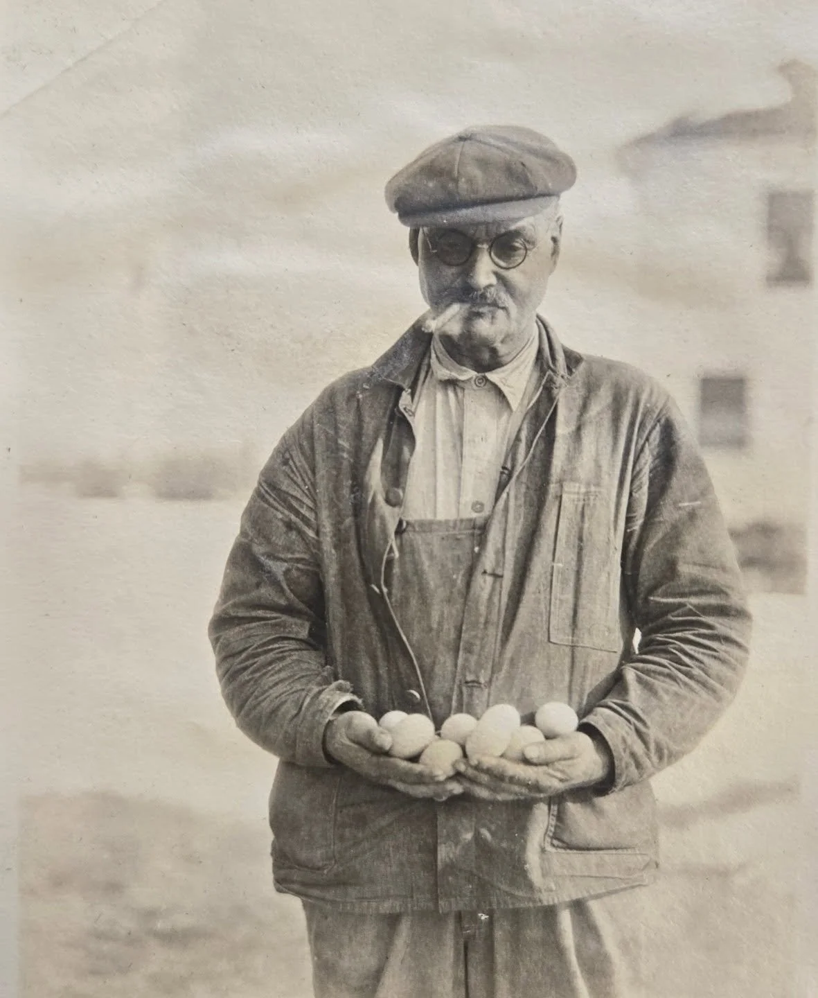 This is Edward Henry Doucette, shown here with a batch of freshly gathered eggs in front of his home at 466 Main Street. 

A wonderful portrait captured in a snapshot, this photograph comes from a Cole-Pratt family photo album at the Boxford Historic