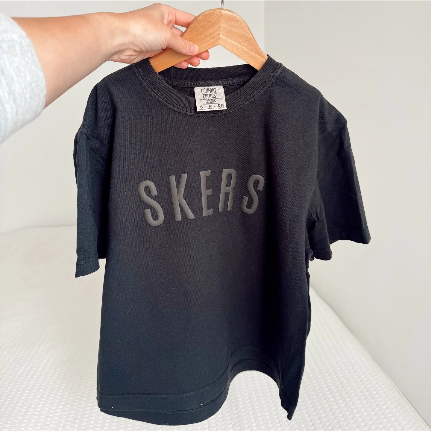 Our black-on-black puffy text design was a best seller at our last pop-up! 🖤 We just added a new black cropped crewneck option &mdash; it&rsquo;s unbelievably soft and cozy. Grab yours before the NE Blackout Game on Nov 1st! Shop now through the lin