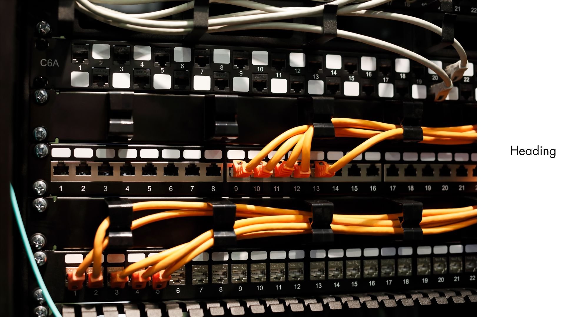 Structured data cabling patch panel with neatly terminated network cables in a comms cabinet