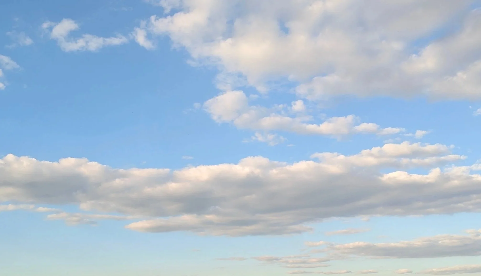 Sky with scattered clouds during daytime.