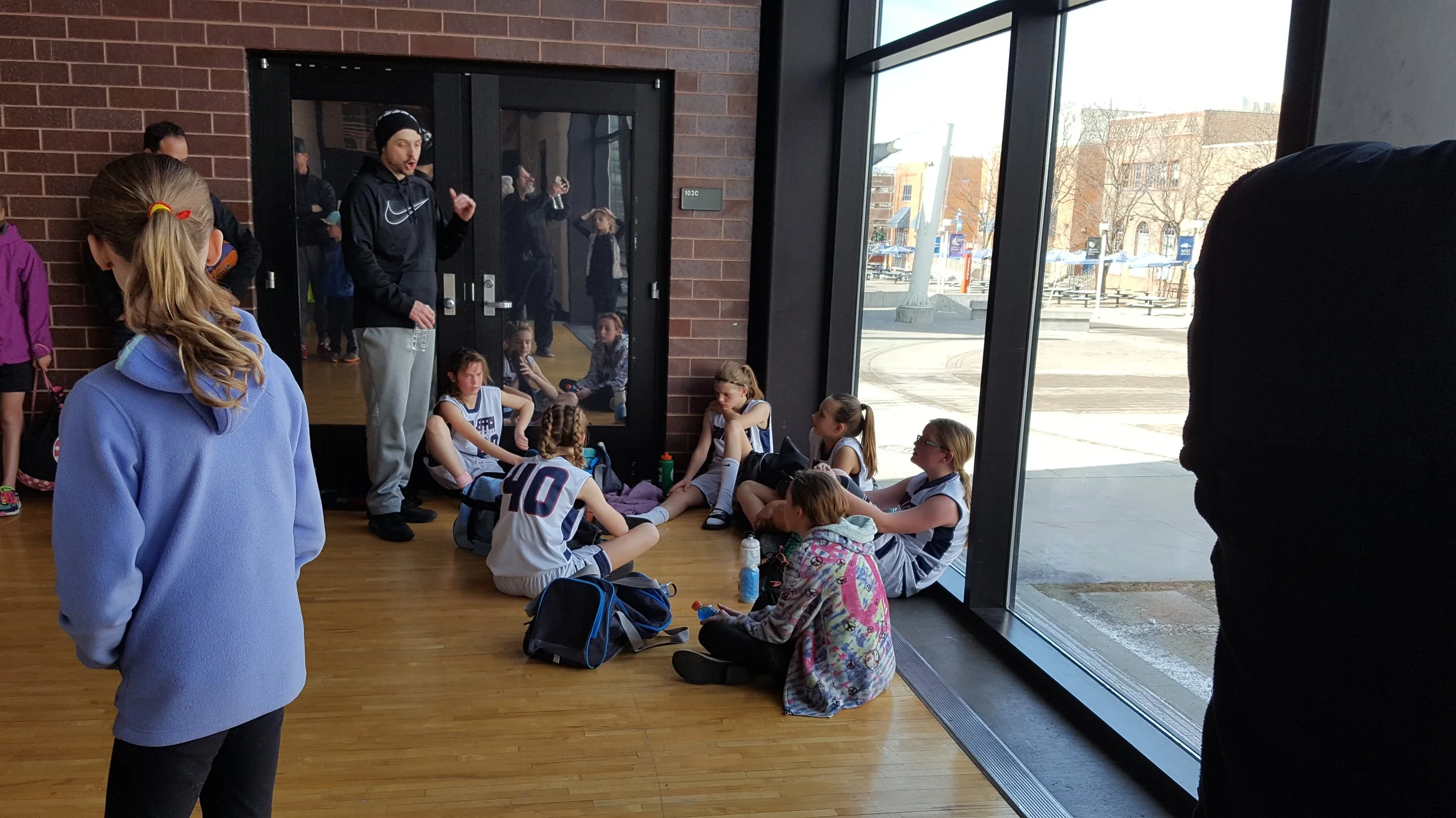 Lions 4th grade girls post game talk as they moved one step closer to their eventual championship!