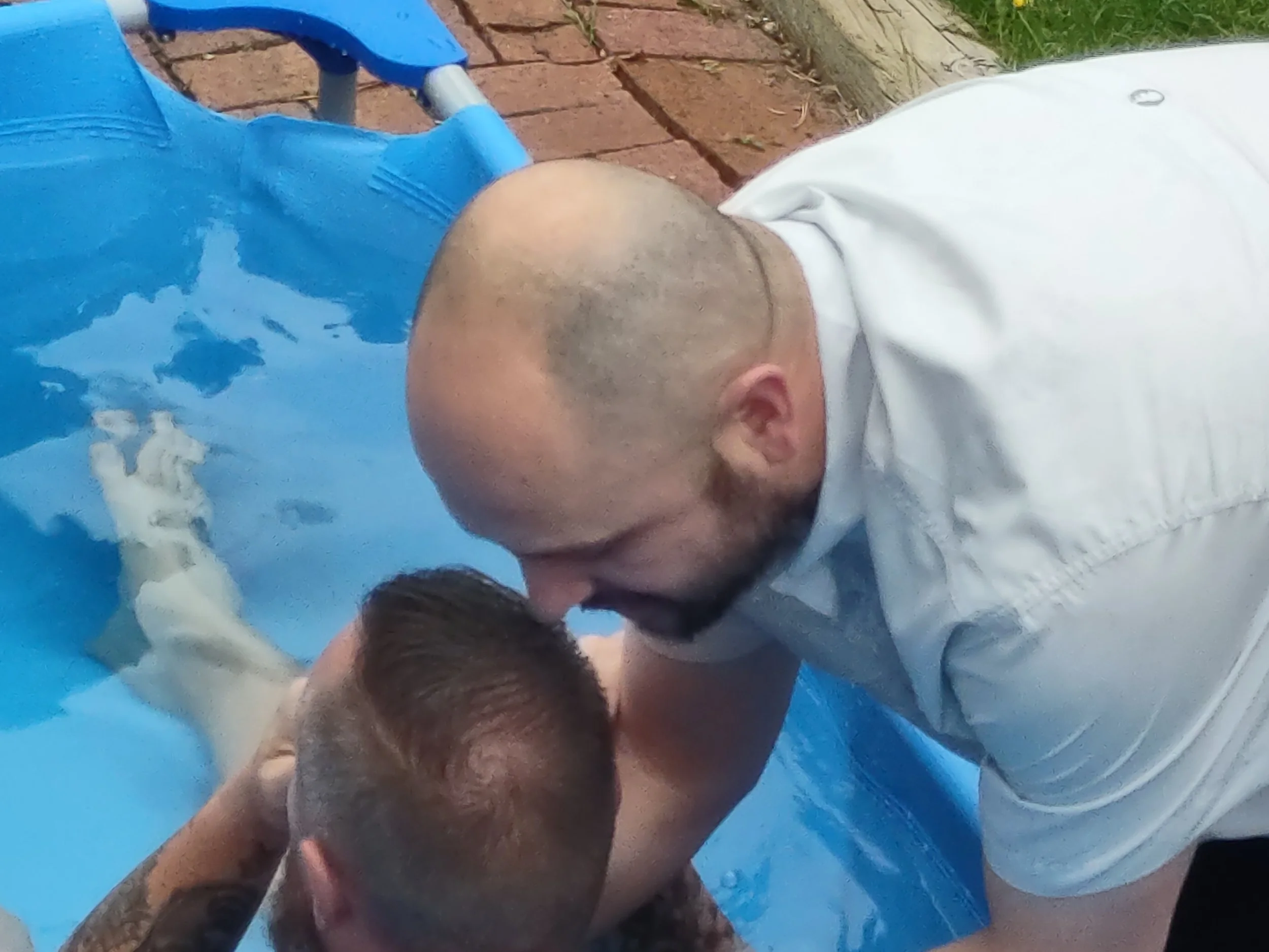 The Baptism of Coach Tim Cornelius who came to faith through Bible studies with Lions Head Coach Reggie Sanchez!