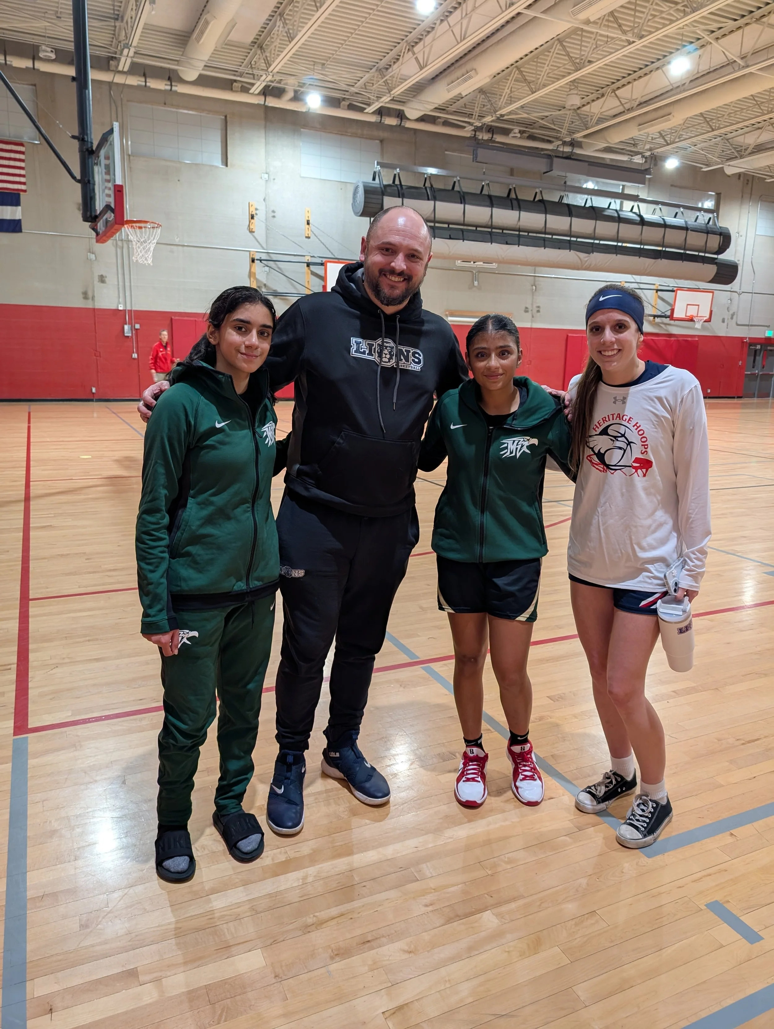 Lions Aaria Jain and Irika Suri of Mountain Vista High School, with Naomi Sanchez who was at Heritage High School at the time.