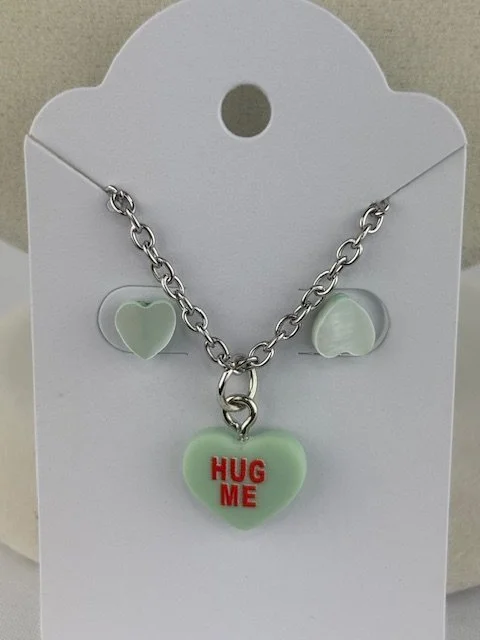 Tatum_ConvoHeart_Green_HUGME_EarringNecklaceSet.jpeg