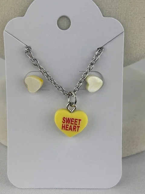 Tatum_ConvoHEart_Yellow_EarringNecklaceSet.jpeg