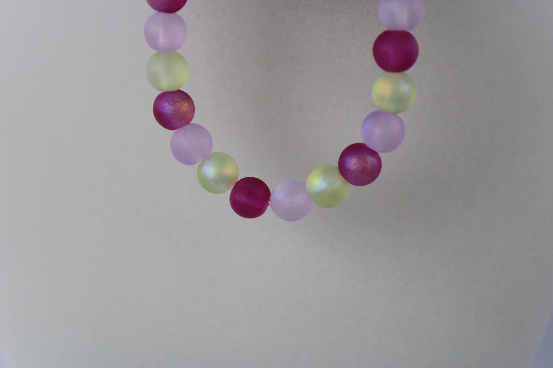 Sydnee red yellow, purple bracelette.JPG