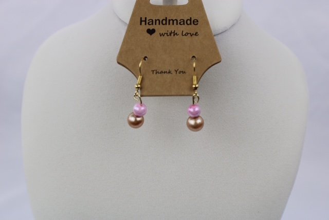 Sydnee pink and champ pearl earrings.JPG