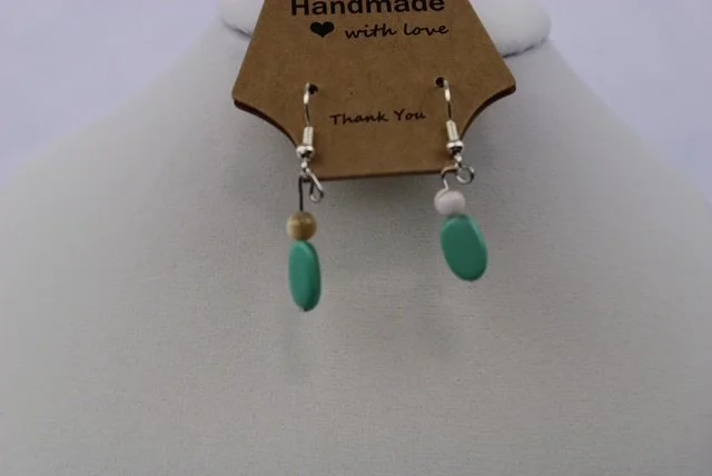 Sydnee Cream and brown and teal bead earrings.JPG